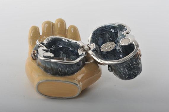 Keren Kopal Zodiac Monkey Laying on Hand