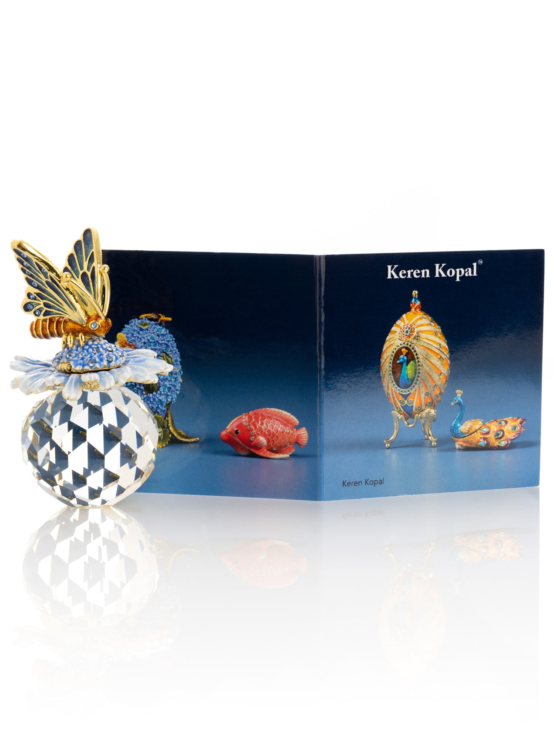 Keren Kopal Butterfly sitting on Flower and Crystal