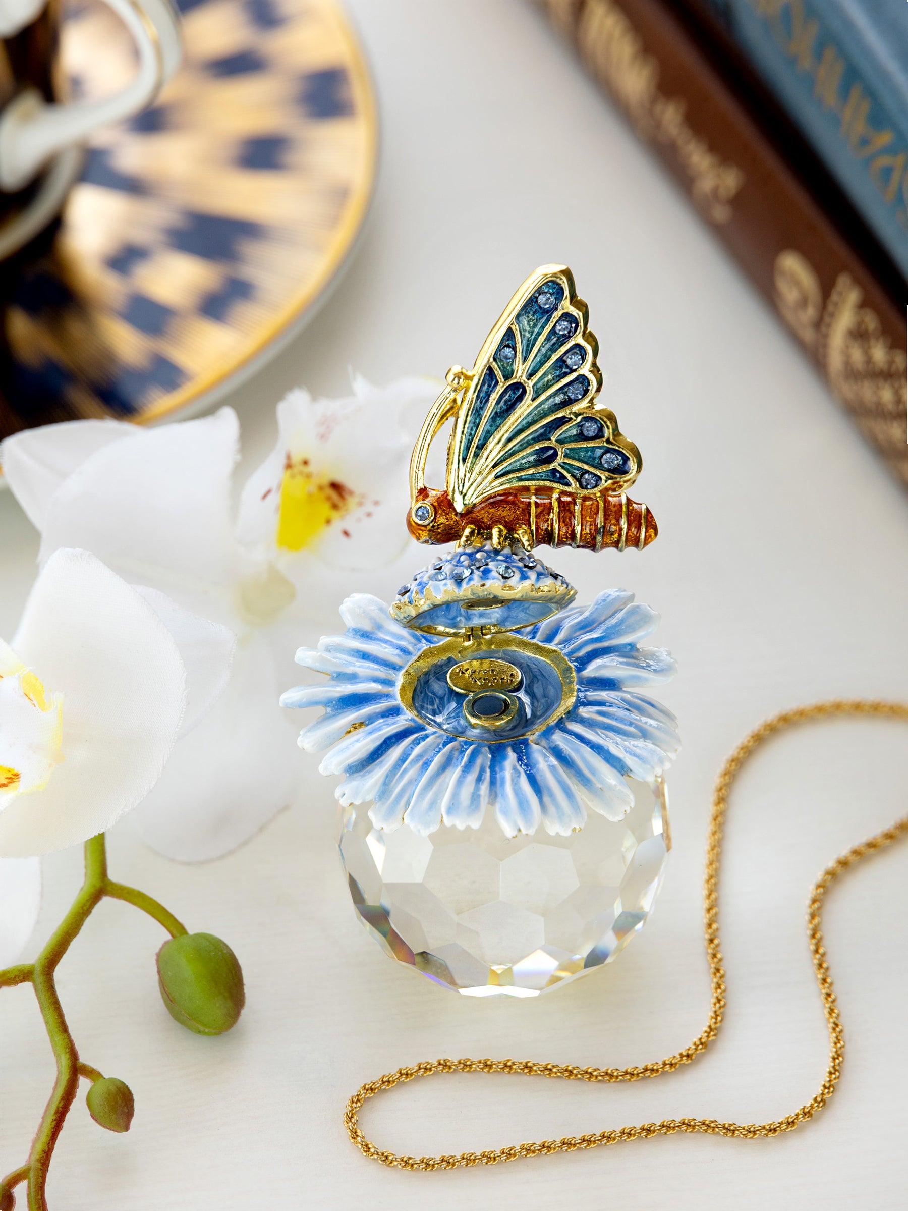 Keren Kopal Butterfly sitting on Flower and Crystal
