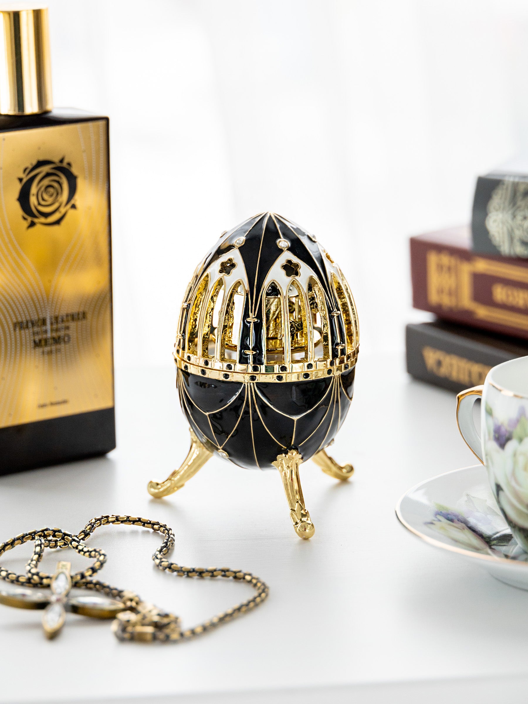 Black and Gold Faberge Egg with Horse Carousel Surprise Inside