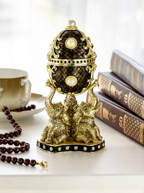 Keren Kopal Regal Brown and Gold Enamel Egg with Elephant Pedestal