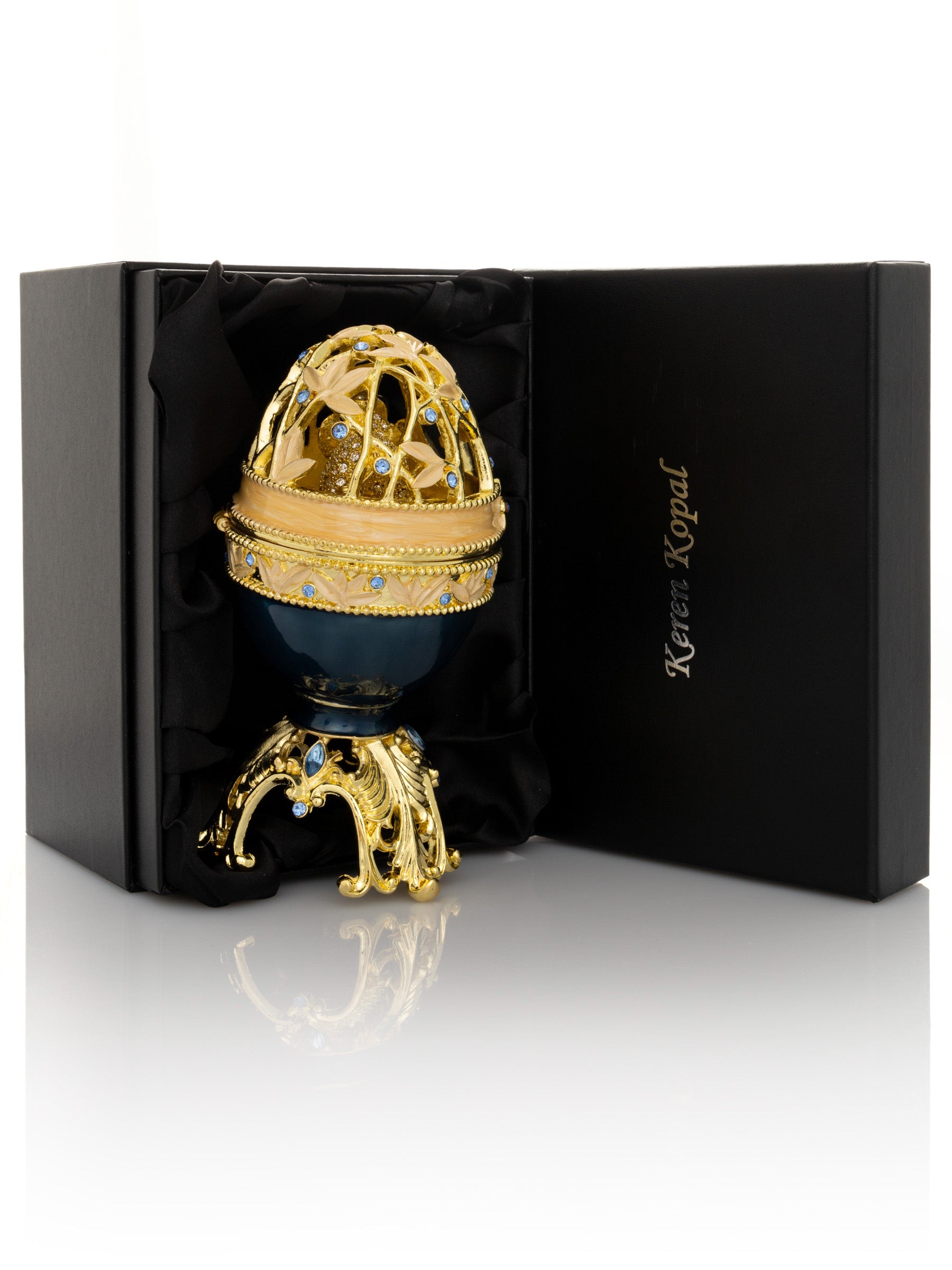 Golden Blue Faberge Egg with a Golden Elephant