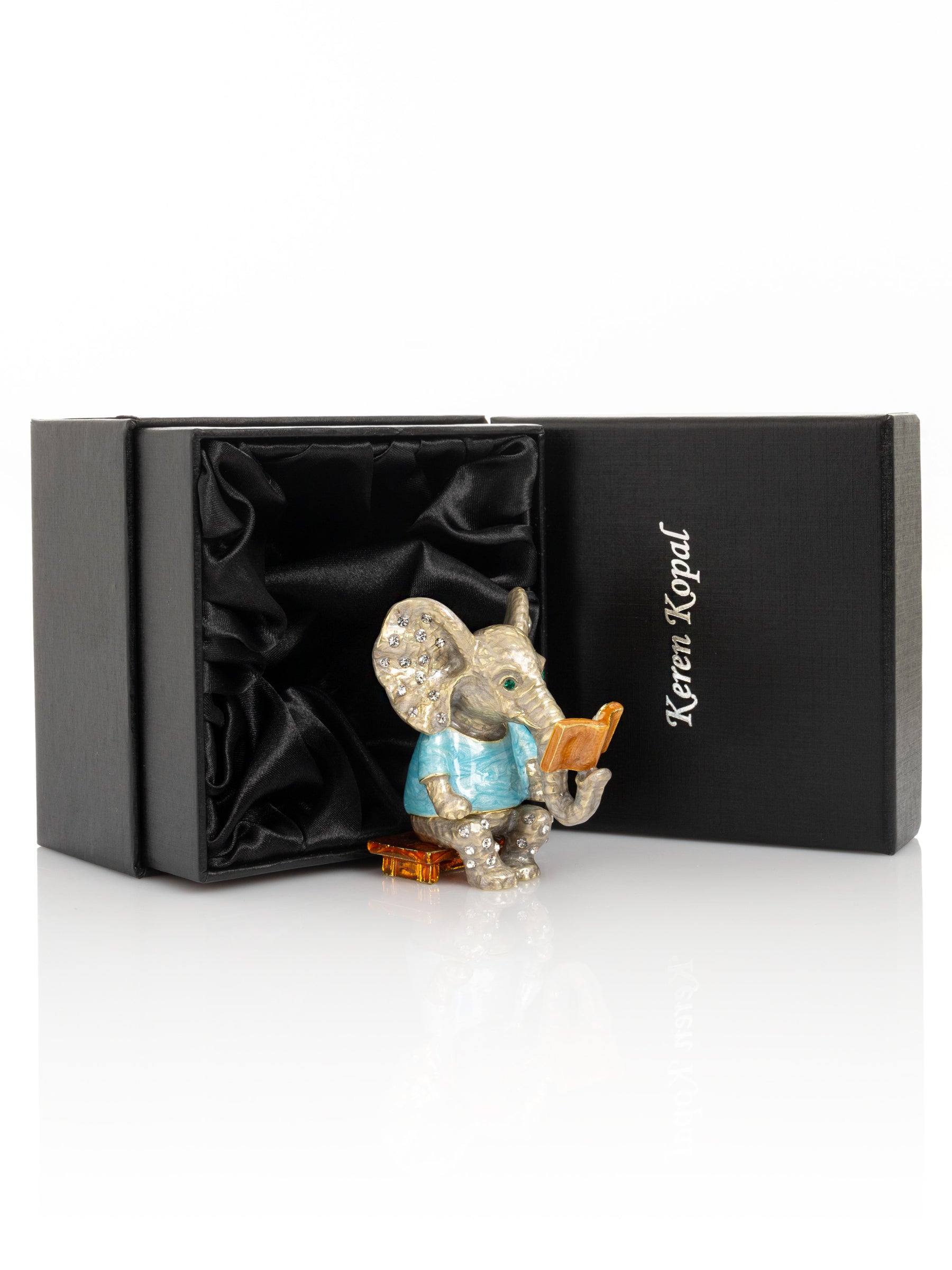 Keren Kopal Elephant Sitting and Reading a Book