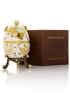 White Faberge Egg with Bees and Flowers