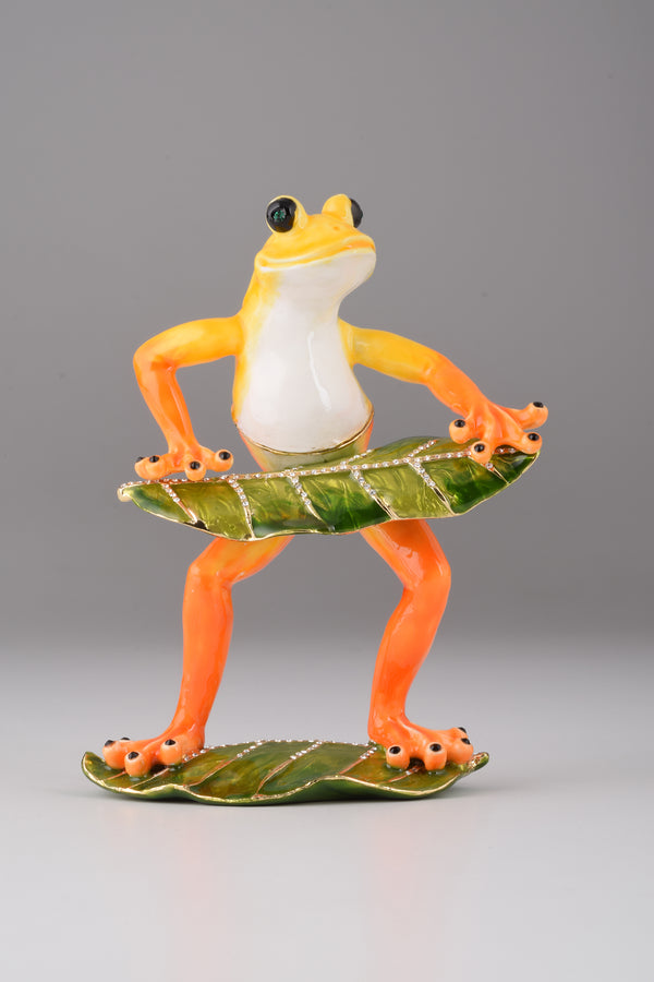 Frosch beim Klavierspielen