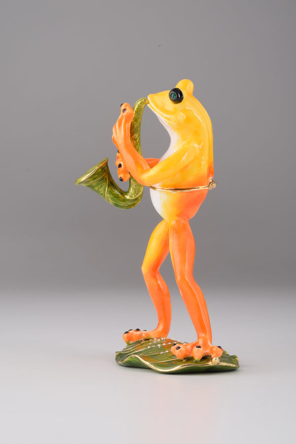 Frosch spielt Saxophon