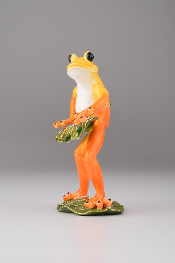 Frosch beim Klavierspielen