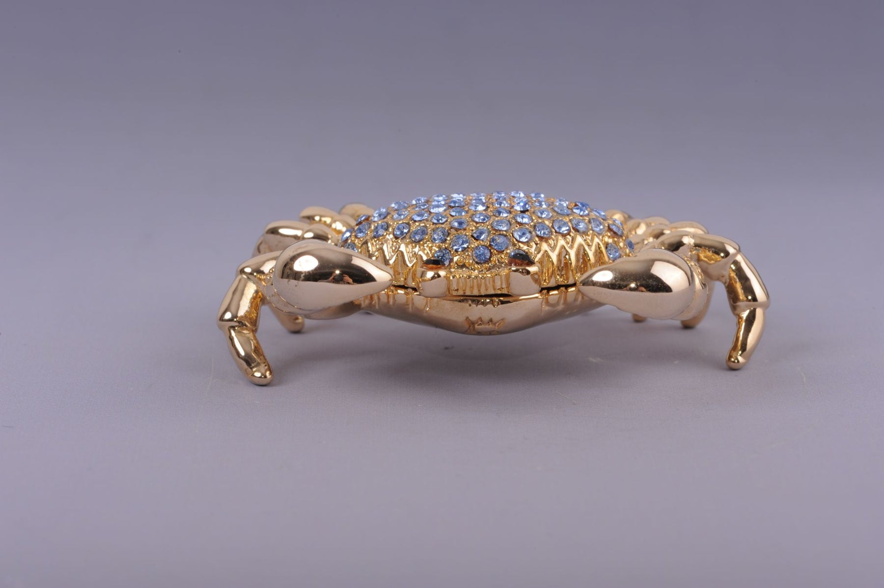 Golden Crab with blue stones