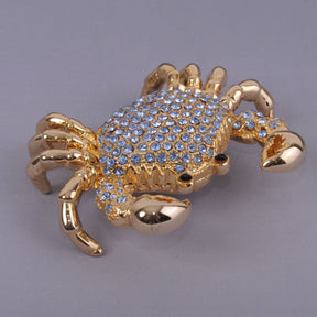 Golden Crab with blue stones