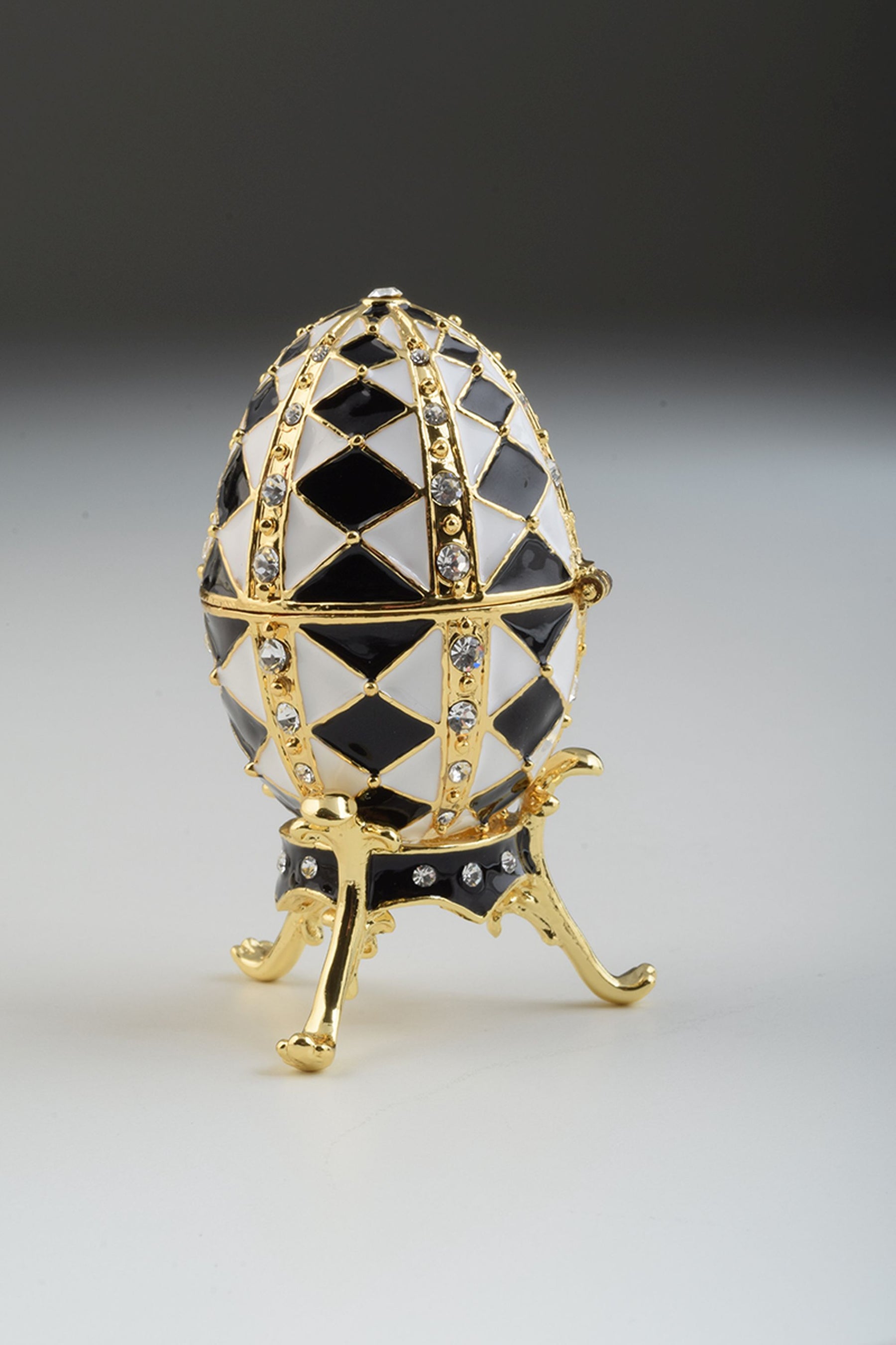 Black and White Faberge Egg with Gold Necklace Inside