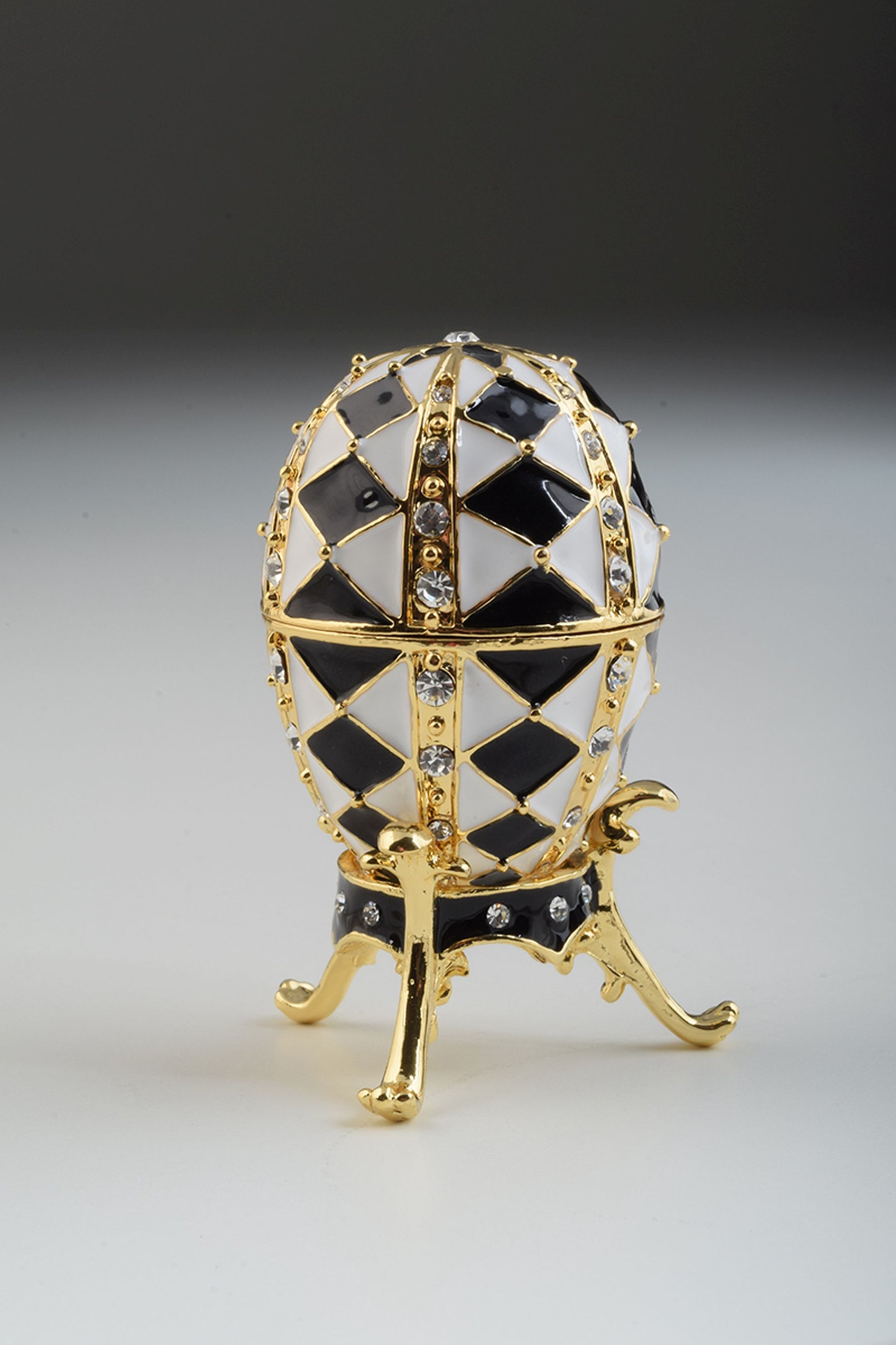 Black and White Faberge Egg with Gold Necklace Inside