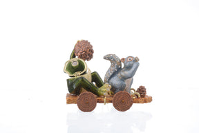 Frog and Squirrel on Wooden Car