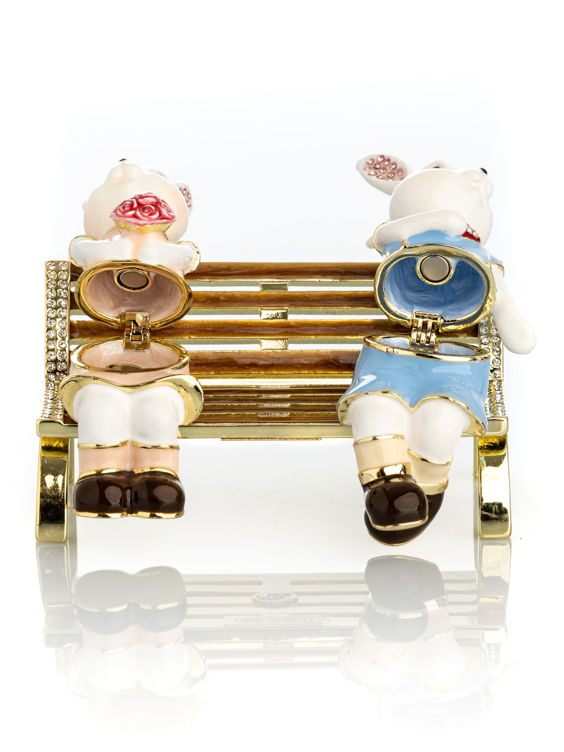 2 bunnies in love sitting on a bench, valentine flowers and chocolates