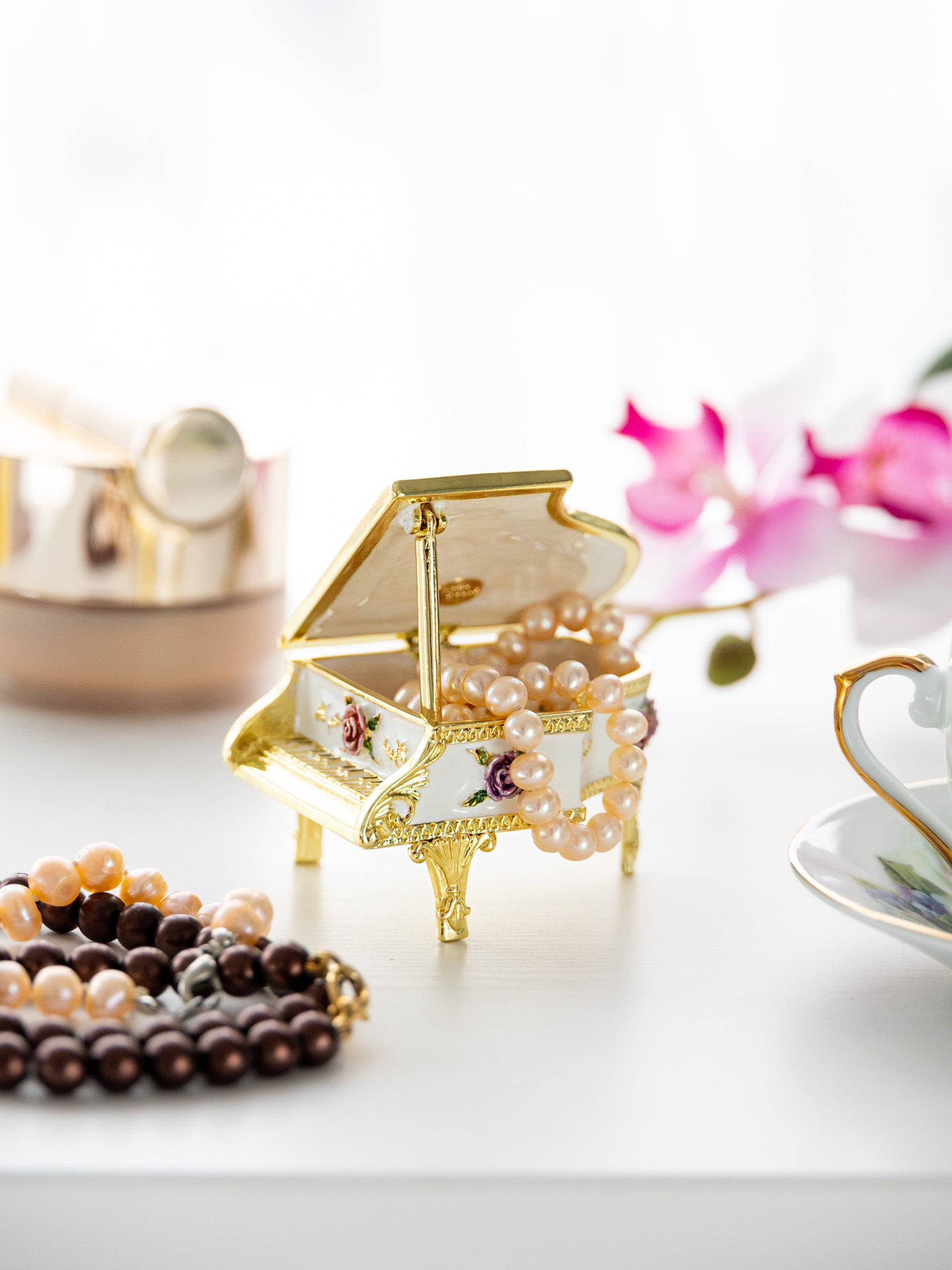 White piano with flowers