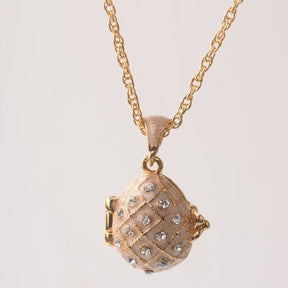 Keren Kopal Pink Pendant Necklace with an Apple Inside  37.00