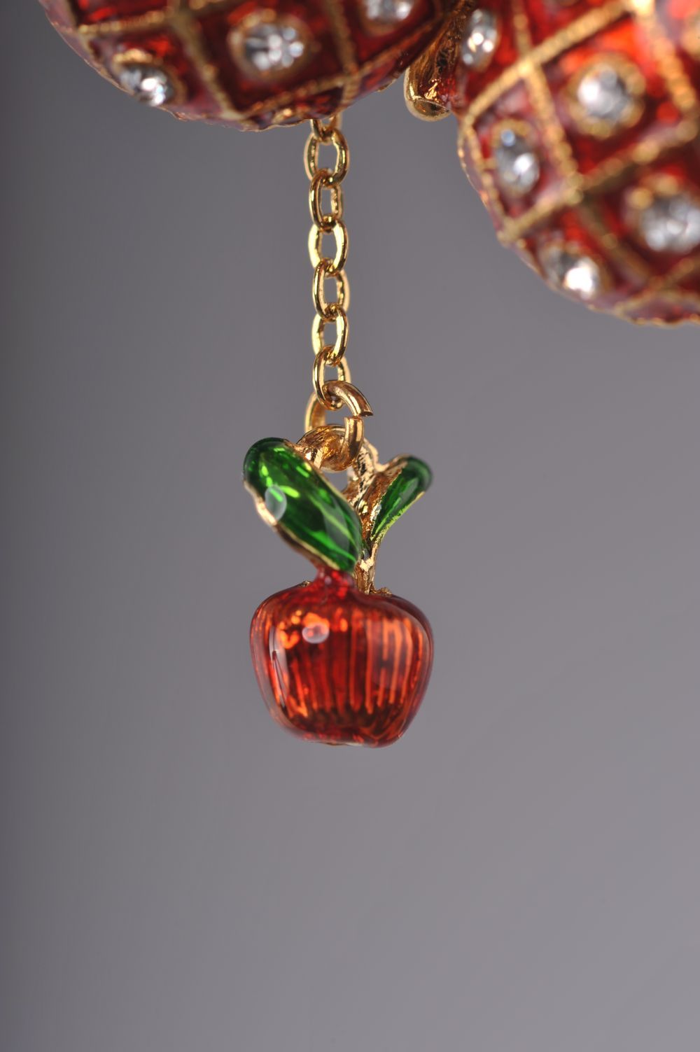 Keren Kopal Red Egg Pendant with a Surprise Apple Inside  36.00