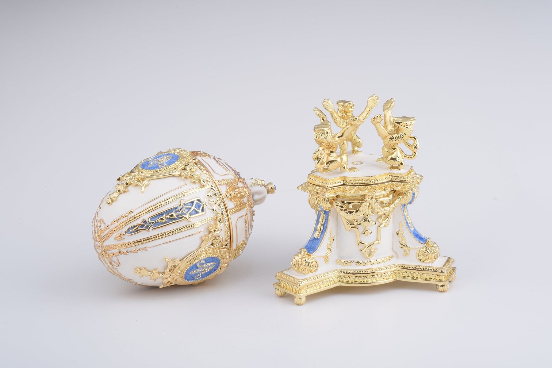 Keren Kopal White Faberge Egg with an Elephant on Top  344.00